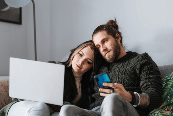 First Date Gifts - couple watching movie on computer