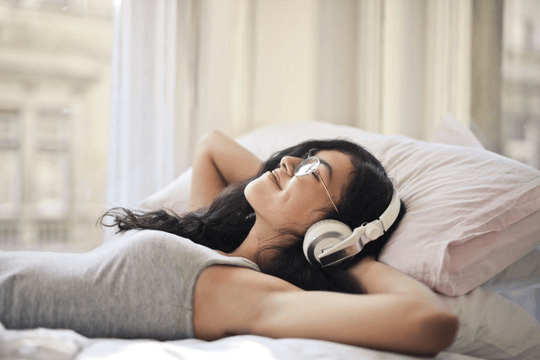 First Date Gifts - woman listening to music
