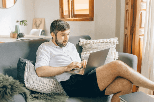 15 Ways to Celebrate a Long Distance Relationship Anniversary - guy on laptop