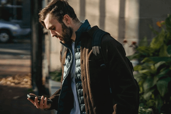 What Age Group Is Tinder For - man using phone