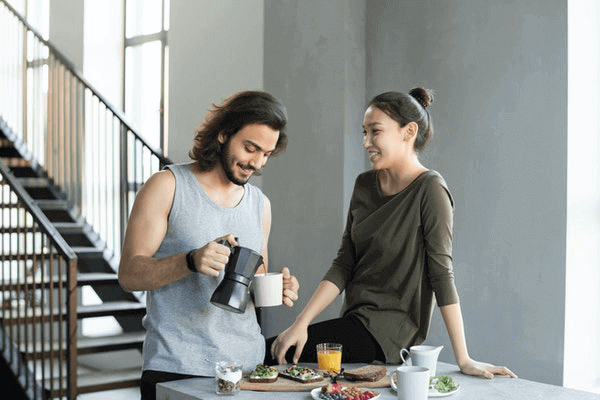 15 Ways To Be A Power Couple - couple having coffee at home