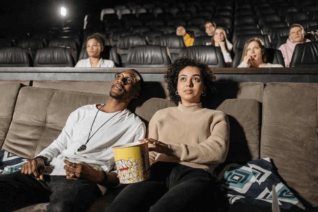 How Do I Plan A Full Day Date - couple watching a play